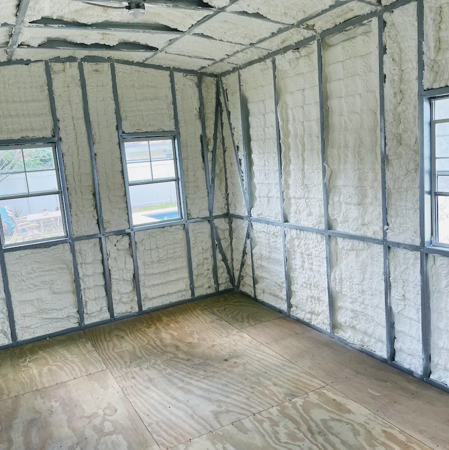 Closed-cell spray foam insulation applied to wall cavities in a residential project in Lockport